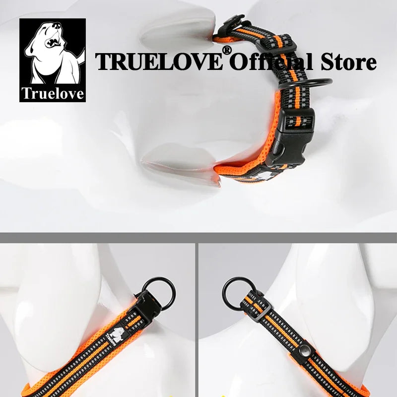 Dog collar with orange and black design on a mannequin, featuring TrueLove brand logo.