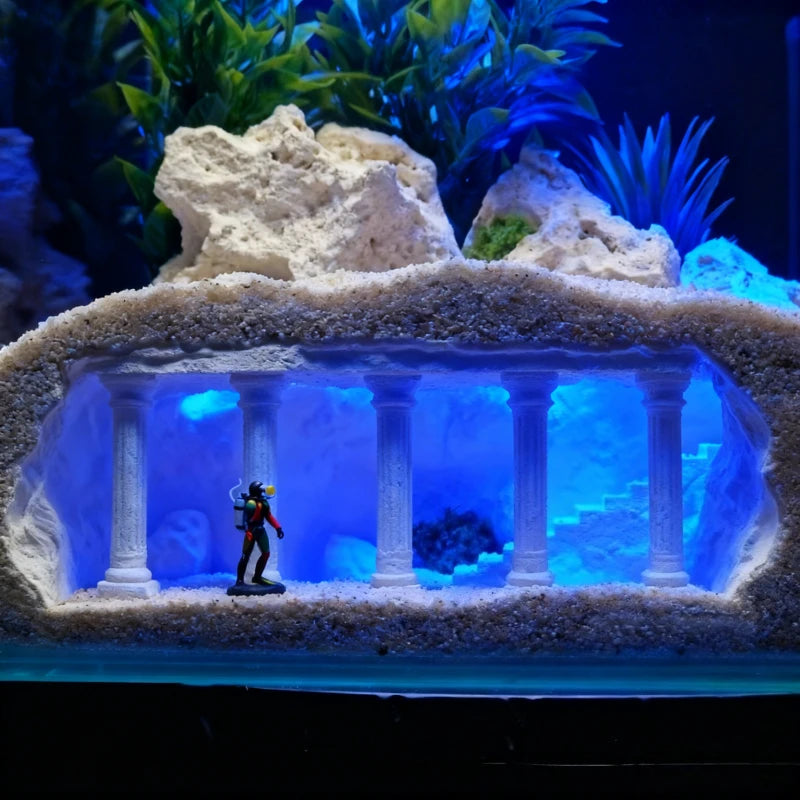 Aquarium scene with underwater temple model and diver figure