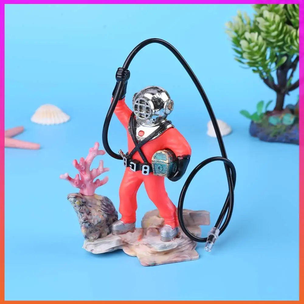 Diver figurine with a hose on a blue background