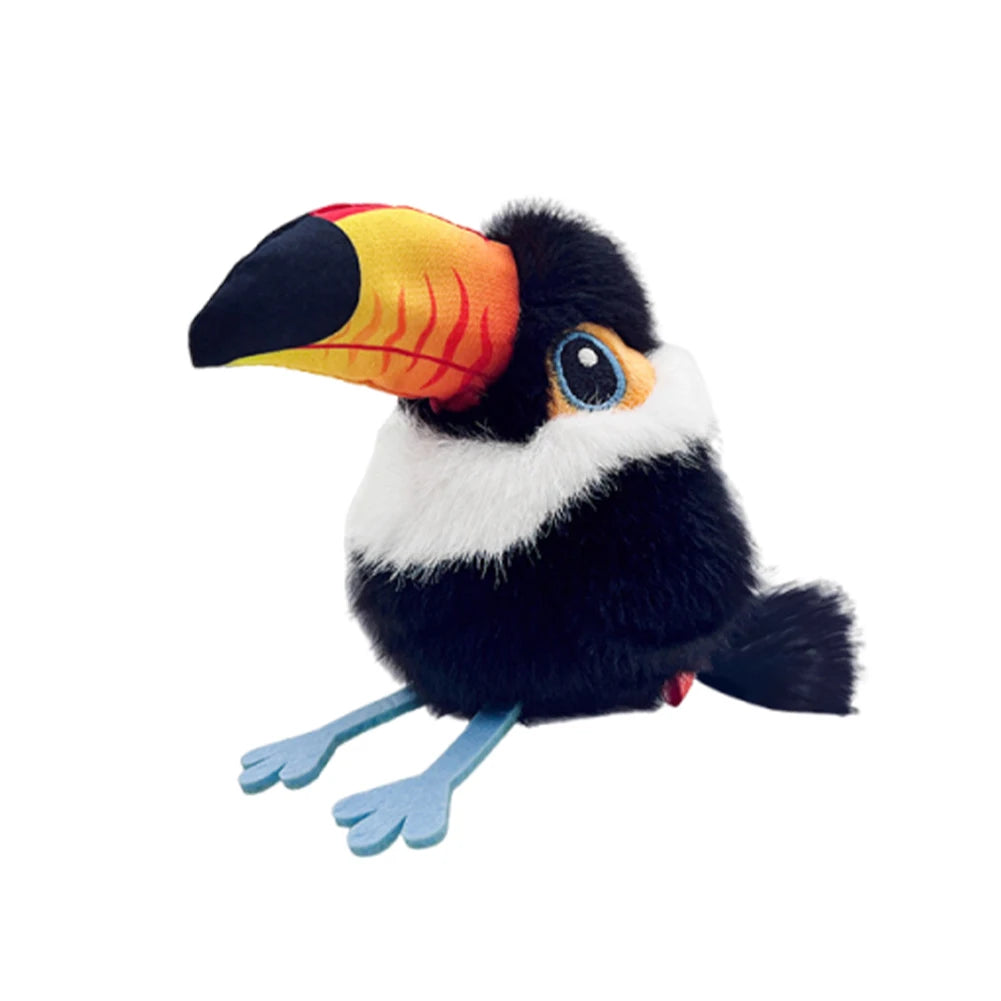 The Pet Interactive Flapping Chirping Bird Cat Toy is a colorful plush toucan with blue feet and eyes, a black body, white neck band, and large beak. This moving toy encourages playful exercise for indoor kittens. Sits upright on a white background.